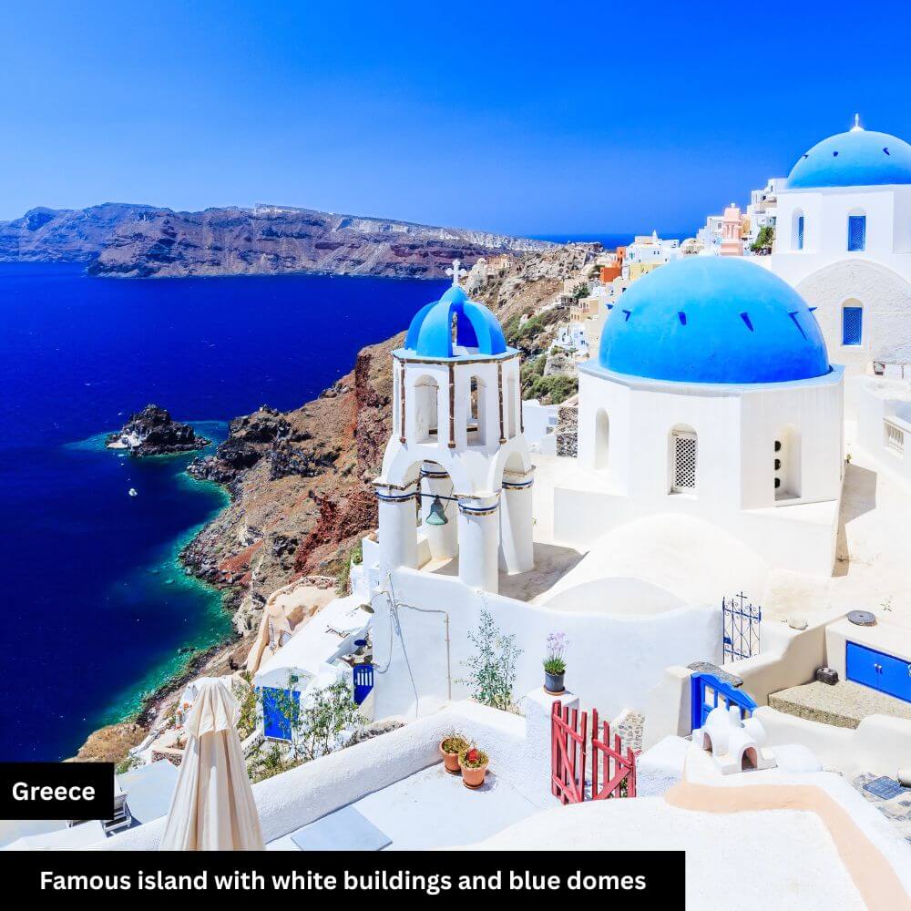 famous island with white building blue domes
