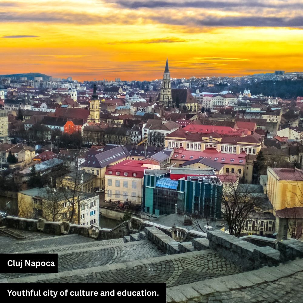Panoramic view of Cluj-Napoca city in Romania, featuring historic architecture, modern buildings, and lively streets surrounded by scenic hills