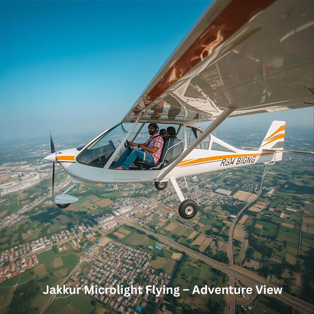 A tourist enjoying microlight flying over Bangalore city at Jakkur Aerodrome.